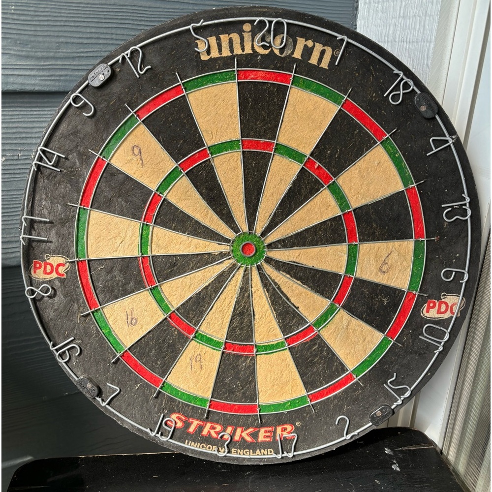 Unicorn Dartboard used once. Brand new